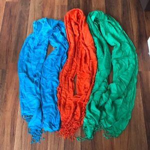 Three solid scarfs